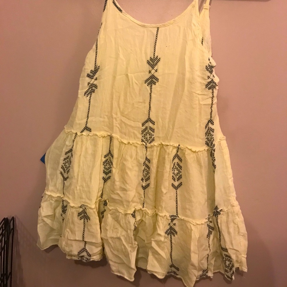 Spaghetti strapped flowey top.